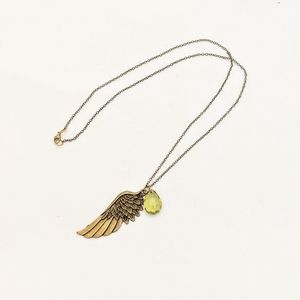 Charm necklace, wing with green gem on chain